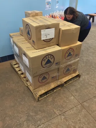 Palletized boxes of custom branded apparel